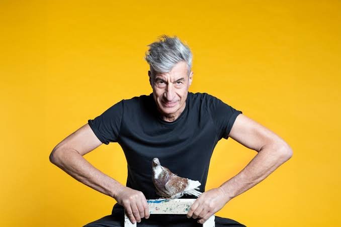 Maurizio Cattelan duct-taped banana artist